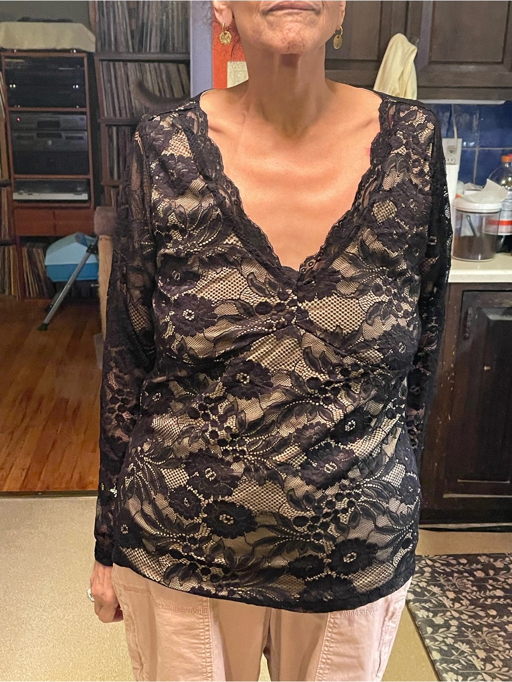 Black lace top with flesh-toned undershirt